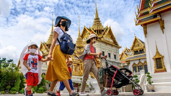 Tourists visiting Grand Palace in Bangkok